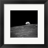 Framed first photograph taken by humans of Earthrise during Apollo 8.