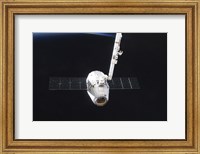 Framed SpaceX Dragon Cargo Craft Prior to Being Released from the Canadarm2