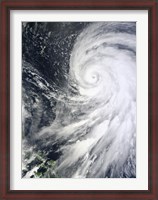 Framed Typhoon Bolaven northeast of the Philippines