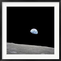Framed Earth Rising Above the Lunar Horizon
