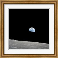 Framed Earth Rising Above the Lunar Horizon