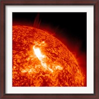 Framed M87 Class Flare Erupts on the Sun's surface