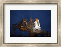 Framed Night view of Space Shuttle Atlantis on the Launch pad at Kennedy Space Center, Florida