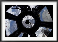 Framed View of Earth through the Cupola on the International Space Station