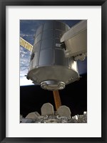 Framed Permanent Multipurpose Module in the Grasp of Canadarm2