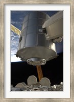 Framed Permanent Multipurpose Module in the Grasp of Canadarm2