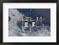 Framed International Space Station Backgropped by a Blue and White Earth