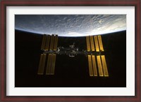 Framed International Space Station  Backdropped against Earth's Horizon
