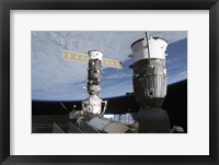Framed Russian Soyuz and Progress Spacecrafts Docked to the International Space Station