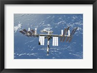Framed International Space Station Backdropped by a Blue and White Part of Earth