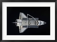 Framed Space Shuttle Atlantis Backdropped Against the Blackness of Space