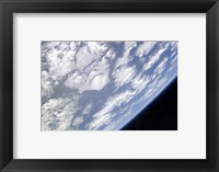 Framed Blue and White part of Earth and the Blackness of Space Viewed from the Earth-Orbiting Space Shuttle Atlantis