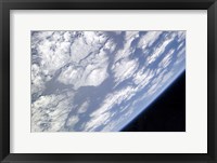 Framed Blue and White part of Earth and the Blackness of Space Viewed from the Earth-Orbiting Space Shuttle Atlantis