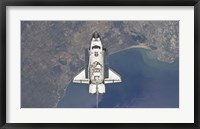 Framed Space Shuttle Atlanti Flying Above the Atlantic coast of Spain and the Gulf of Cadiz