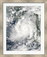 Framed Cyclone Giri moves Ashore over Burma