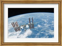 Framed International Space Station backdropped by Earth's Horizon