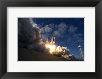 Framed Space Shuttle Atlantis Lifts off from the Launch pad at Kennedy Space Center, Florida