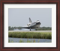 Framed Space Shuttle Endeavour touches down on the runway
