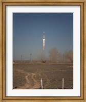 Framed Soyuz TMA-16 Launches from the Baikonur Cosmodrome in Kazakhstan