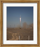 Framed Soyuz TMA-16 Launches from the Baikonur Cosmodrome in Kazakhstan