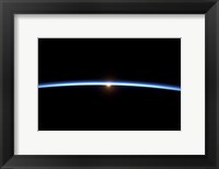 Framed Thin line of Earth's Atmosphere and the Setting Sun