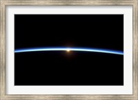 Framed Thin line of Earth's Atmosphere and the Setting Sun