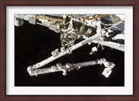 Framed Canadian-Built Space Station Remote Manipulator System (Canadarm2), during Undocking AWctivities