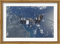 Framed International Space Station above Earth