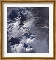 Framed Bezymianny Volcano Exhibits a Modest Plume