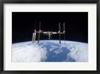 Framed International Space Station backdropped by Earth's Horizon
