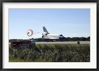Framed Space Shuttle Atlantis Unfurls its Drag Chute upon Landing at Kennedy Space Center, Florida