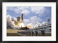 Framed Space Shuttle Atlantis Lifts off from its Launch Pad