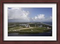 Framed Space Shuttle Atlantis and Endeavour Sit on their Launch Pads at Kennedy Space Center