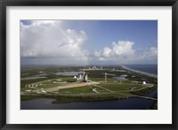 Framed Space Shuttle Atlantis and Endeavour Sit on their Launch Pads at Kennedy Space Center
