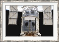 Framed Portion of the Hubble Space Telescope Locked down in the Cargo Bay of Space Shuttle Atlantis