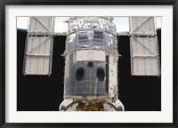 Framed Portion of the Hubble Space Telescope Locked down in the Cargo Bay of Space Shuttle Atlantis