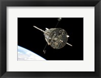 Framed Hubble Space Telescope in Orbit above Earth