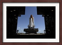 Framed Atlantis Rolls Toward the Open Doors of the Vehicle Assembly Building at Kennedy Space Center
