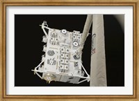 Framed Japanese Experiment Module Exposed Facility in the Grasp of the Shuttle's Remote Manipulator System Arm