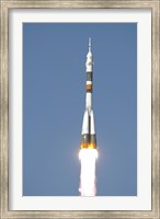 Framed Soyuz TMA-12 Spacecraft Lifts Off into a Cloudless Sky