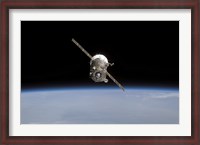 Framed Soyuz TMA-11 Spacecraft Above Earth's Horizon