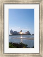 Framed Space Shuttle Discovery Lifts Off