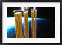 Framed Partial View of International Space Station Solar Panels and Earth's Horizon