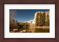 Framed El Capitan towers over Merced River, Yosemite, California