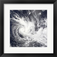 Framed Tropical Cyclone Daman over the South Pacific Ocean