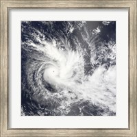 Framed Tropical Cyclone Daman over the South Pacific Ocean