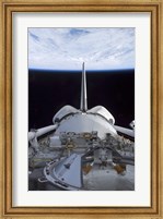 Framed Space Shuttle Discovery's Cargo Bay