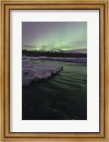 Framed Aurora Borealis over Creek, Yukon, Canada