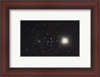Framed Saturn in the Beehive Star Cluster