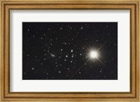 Framed Saturn in the Beehive Star Cluster